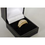 A diamond encrusted white and yellow gold ring, hallmarked 9ct, 0.5ct approximately, 5.6g total