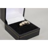 A diamond five stone gold ring, hallmarked 18ct, 0.45ct approximately, 5.2g total weight.