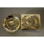 A Chinese .90 white metal cigarette box, by Wang Hing, decorated with a dragon, 10cm wide; together