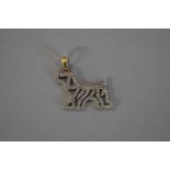 A diamond set dog pendant, stamped 9k, approx 0.5ct, 3cm, 2.5g total weight.