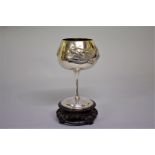 A Chinese silver goblet, by Wang Hing & Co, repousse decorated with a dragon, 15.5cm high, 255g,