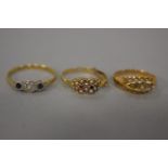 Three various gem set gold rings, hallmarked 18ct, 4.5g total weight.