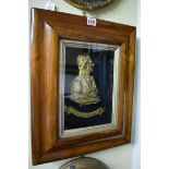 A gilt brass portrait profile plaque of The Duke of Wellington, in a rosewood frame, the whole 44