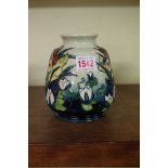 A Moorcroft 'Lamia' pattern vase, 14.5cm high.