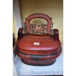 A Chinese red lacquered marriage casket, with swing handle, 30cm wide.