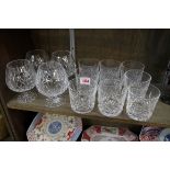 A set of nine Waterford glass tumblers; together with a further set of four brandy balloons.