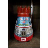 A vintage 'Made in Japan' tinplate battery operated spaceship, 23cm high.