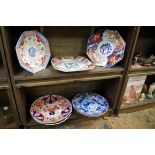 A collection of Japanese Imari plates, largest 30.5cm diameter. (7)