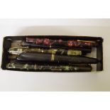 Twelve vintage fountain pens, each with 14k nib, one lacking cap.