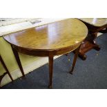 A pair of circa 1900 mahogany demi lune console tables, 106.5cm wide.