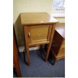 A Gordon Russell 'Saintbury' oak bedside cupboard, bearing original Russell Workshops label