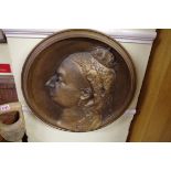 A large gilt bronze portrait relief plaque of Queen Victoria, 46cm diameter.