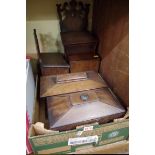 A collection of antique boxes and caskets.