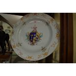 A Chinese famille rose armorial charger, Qianlong, 42cm diameter, (rim chip and associated