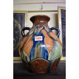 A Belgian majolica twin handled vase, 28cm high.