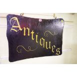 An old painted wood double sided 'Antiques' sign, 50.5 x 70cm.