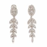 DIAMOND DROP EARRINGSWhite gold as cascading leaves with brilliant cut diamonds. Total weight 0.