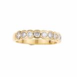 DIAMOND RING.Yellow gold with nine brillaint cut diamonds. Total approx weight 0.80ct. Band 17.5mm