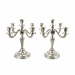 PAIR OF SILVER SPANISH CANDELABRAS, MID C20thHallmarked. Four arms & five lights. Decoration of