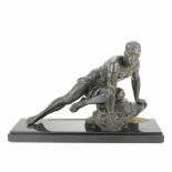 JEAN DE RONCOURT (FRANCIA, SIGLOS XIX-XX) "SUR LA PISTE".Art deco sculpture in white metal on