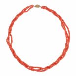 CORAL NECKLACEThree stands of coral beads, gilded low grade silver clasp.- - -18.00 % buyer's