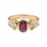 RUBY AND DIAMOND RINGYellow gold with 0.48ct oval cut central ruby & brillianat cut diamonds.