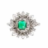EMERALD AND DIAMOND RINGFlower shaped in white gold with square cut central emerald approx. 0.