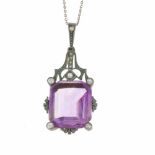 LARGE AMETHYST PENDANT, EARLY C20th8kl gold & silver with approx. 0.10ct brilliant cut diamonds.
