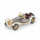 SILVER SCALE MODEL OF JAGUAR SS 100Main body in hallmarked silver, chrome trim, rubber wheels&