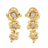 OCTAVIO SARDÀ. GOLD. AND DIAMOND EARRINGSOCTAVIO SARDÀ.Yellow gold in three parts to form flowers