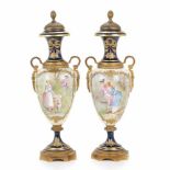 PAIR OF SEVRES STYLE VASES, EARLY C20thGIlded porcelain with gilded bronze mount. Corbels with