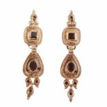 C19th STYLE CATALAN DROP EARRINGSEngraved gold with garnets. Catalan clasp. 7cm long- - -18.00 %