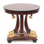 ENGLISH REGENCY CENTRE TABLE, C20thPartially gilded mahogany. Pedestal carved in the form of three