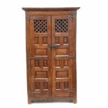 RUSTIC SPANISH CUPBOARD, C20thPanelle wood, two doors, Locks & handles in cast iron. Minor flaws.