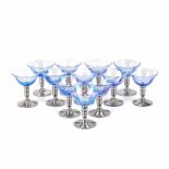 SET OF TWELVE ART DÉCO STYLE LIQUEUER GLASSES, MID C20thCut glass with stems & base enamelled in