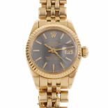 ROLEX. WOMAN'S WRISTWATCHROLEX., OYSTER PERPETUAL. DATEJUST.Yellow gold with black iridescent