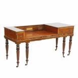 PIANO CONVERTED INTO A WRITING DESK, C20th.Carved wood, bronze handles, on wheels. 82 x 169 x 65cm.-