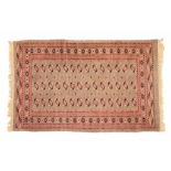 AFGHAN CARPET, C20thWool & silk in pink tones, hand knotted. 207 x 121cm- - -18.00 % buyer's premium