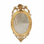 OVAL SPANISH MIRROR, C19thCarved painted & gilded wood. Crown finished with flower motifs. Damage