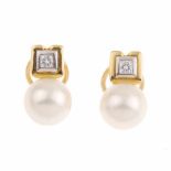 YOU AND I EARRINGS.Yellow & white gold with brilliant cut diamonds approx weight 0.10ct & pearl of