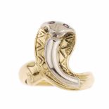 CELLINI. COBRA RINGCELLINI.Yellow & white engraved gold in the shape of a cobra, Two garnets for