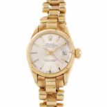 ROLEX. WOMAN'S WRISTWATCHROLEX., OYSTER PERPETUAL. DATEJUST.Yellow gold with silver coloured, un-