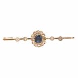 SAPPHIRE BROOCHYellow gold with rose cut diamonds & central oval cut sapphire.Approx 0.34ct. 5cm