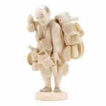 JAPANESE SCHOOL, MEIJI PERIOD, LATE C 19th OKIMONO, "SCRAP DEALER"Carved ivory, engraved & tinted.