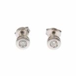 DIAMOND STUD EARRINGS.White gold with brilliant cut diamond. Total weight approx. 0.20ct Clip ons