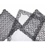 THREE LACE MANTILLAS, C20thtwo machinemade & one handmade. 200 x 83cm; 197 x 87cm; 203 x 70cm.- - -