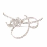 DIAMOND BROOCH.White gold with brilliant cut & baguette diamonds. Total approx weight 5.60ct. 7 x