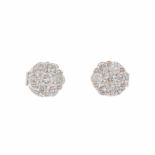 DIAMOND ROSETTE EARRINGS.Yellow gold with brilliant cut diamonds creating a roestte. Total weight