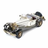 SCALE MODEL OF 1935 MERCEDES, SILVER.Main body in hallmarked silver, chrome trim, rubber wheels. 1.
