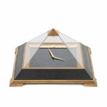 JAEGER LE COULTRE. TABLE TOP CLOCK, CIRCA 1970Pyramid shaped in brass, plexiglass & simulated